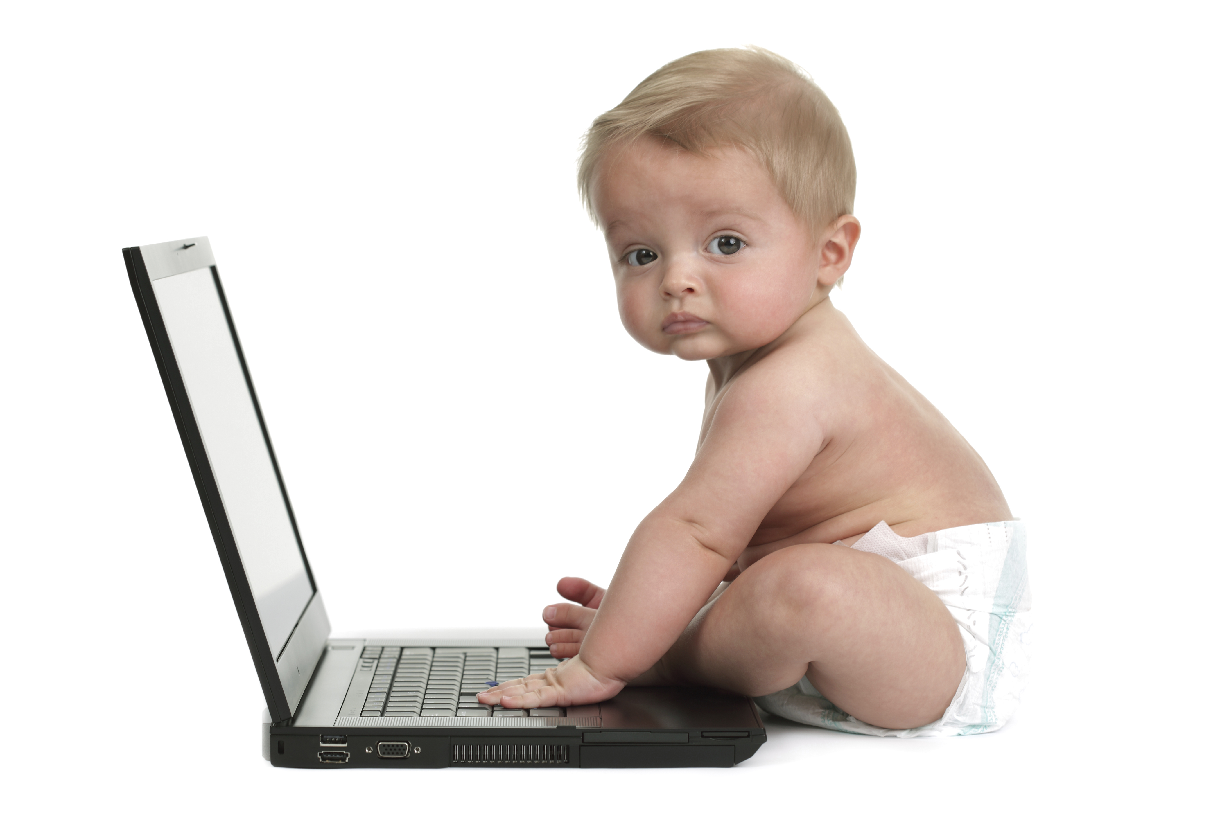 Baby boy using a laptop computer
